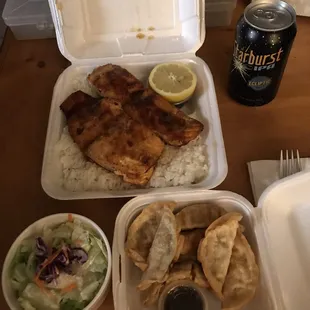 The whole meal deal. Salmon teriyaki with a side of gyoza. Beer was my own touch, not sold here.