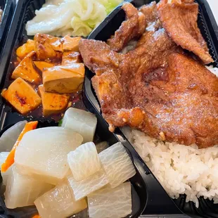Railroad pork chop bento with sautéed daikon radish, spicy mapo tofu, and sautéed cabbage