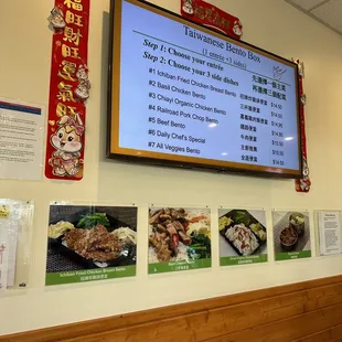 a menu on the wall of a restaurant