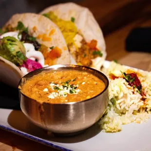 Tacos (one steak, one pickle fried taco), green chile rice, and smoky pinto