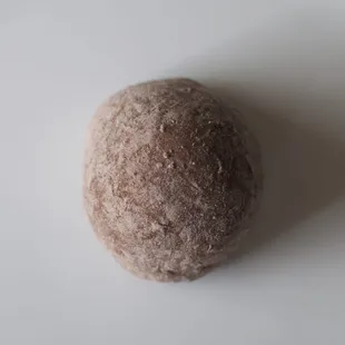 Waialua Dark Chocolate Truffle Mochi, in its untouched state.