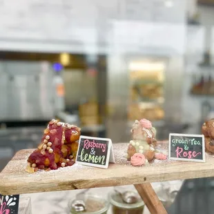a variety of pastries on display in a bakery