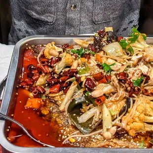 House Signature Roasted Fish: a mouthwatering dish ideal for those with an affinity for Szechuan flavors!