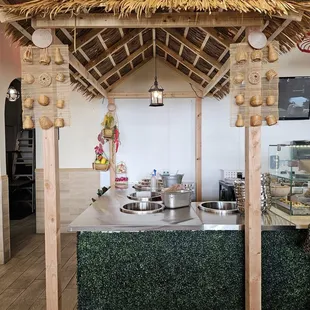 a restaurant counter with a number six on it