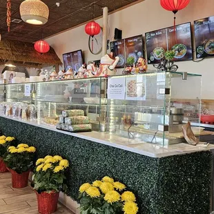 a restaurant with a long counter