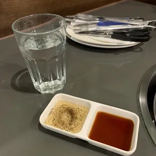 a plate of food and a glass of water