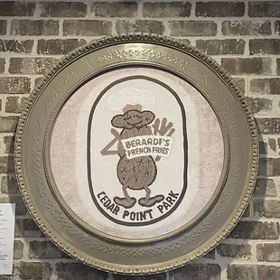the logo on the wall