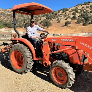 Tehachapi resident Taylor enjoying his Kubota L2501DT. Taylor trusts and chooses Berchtold Equipment for his equipment needs.