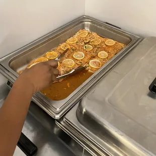 a pan of food being prepared