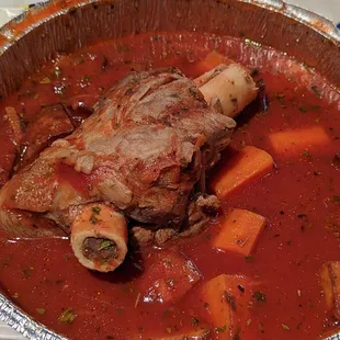 Lamb shank dish stewed with potato and carrots