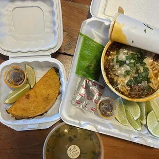 a meal in a styrofoam container