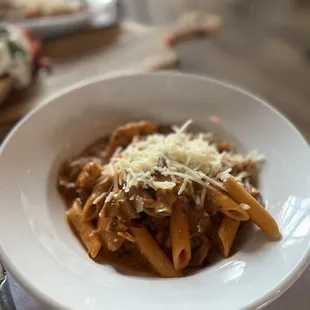 a pasta dish with meat and cheese