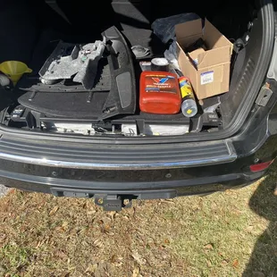 For some reason, the took apart the trunk compartments and lining. A pain to put back together.