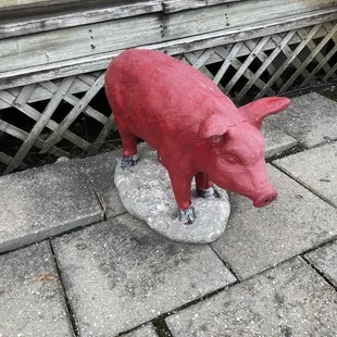 a red pig statue