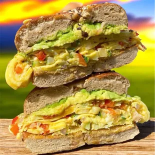 Delicious veggie omelette with avocado on a 3-seed (multi-grain) bagel! All made fresh in house every day!!