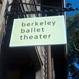 understated sign it in the alleyway  that marks the secret entrance to this elite gem