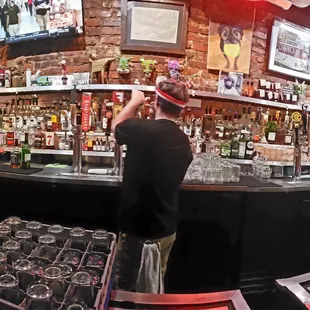 a bartender at the bar