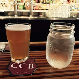 Cigar City Brewing &quot;Jai Alai&quot; beer and water served in a mason jar.