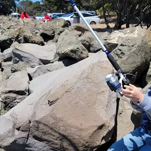 Him trying to fish without the reel arm