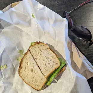 a sandwich and sunglasses