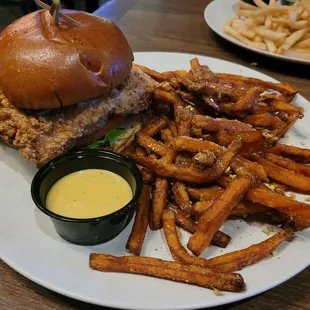 Huge fried chicken sandwich with sweet potato fries. 11.17.21