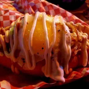 Ass Cobra - Get it with a meat sausage or a vegan dog as I elected. Fried udon noodles , vegan dog, over easy egg, teriyaki,  Japanese mayo.