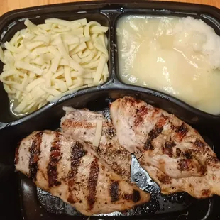 Charbroiled chicken breast w/ noodles, mashed potatoes and gravy