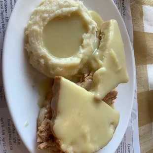 Hot turkey sandwich and mashed potatoes.