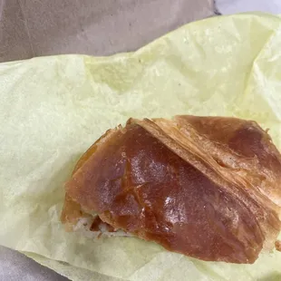 Bacon egg and cheese sandwich on a croissant