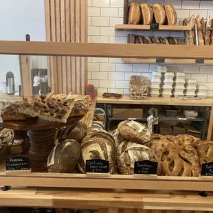 specialty breads- 100% rye, california whole wheat, sunshine loaf, roasted garlic fougasse, focaccia (all sourdough)