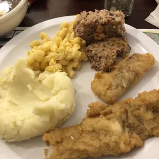 Fish- "ham loaf" (very weird) hard mashed potatoes and dried out Mac n cheese.
