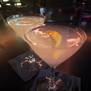 two cocktails on a table