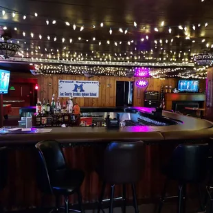 a bar with a lot of lights