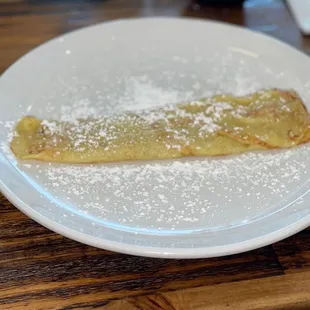 Crepe with powdered sugar.