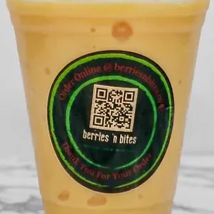 Aloha!! A refreshing smoothie with pineapple, mango, banana, apple, pear, and a creamy touch of coconut &amp; prebiotic &amp; immunity boosters.