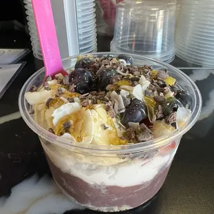 a dessert in a plastic cup