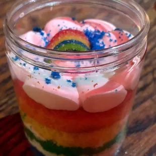 a colorful dessert in a jar