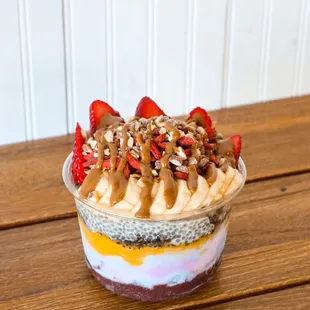 a dessert in a plastic cup