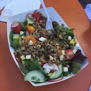 The berry good farm signature salad with quinoa