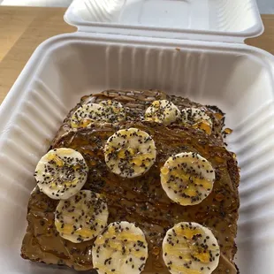 Peanut butter toast with honey, bananas, and chia seeds