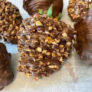 four chocolate covered strawberries