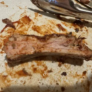 BBQ Spareribs.  Ordered two &quot;full&quot; racks and one main thing missing.  This bbq had no smoke ring.