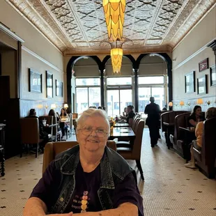 Mom at lunch time in a beautifully restored setting. All have aged well.