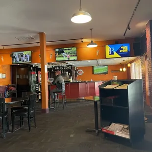 Awkward design. Sports bar vibes with beach decor.