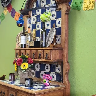 Here is their hutch with some wine on it