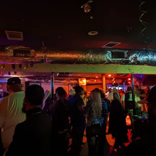 a group of people in a bar