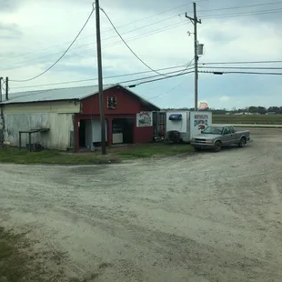 a truck parked in front of a building