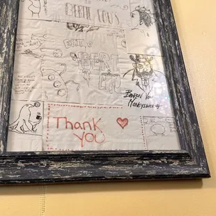 Wall decor is all over and pictures drawn on napkins from past customers :) very awesome and entertaining