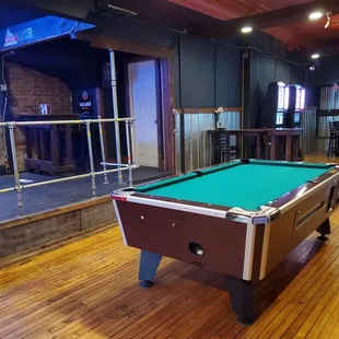 Pool table in the back room by the stage