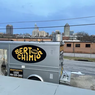 a food truck parked on the side of the road